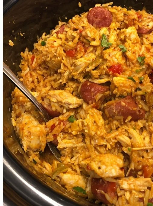 A bowl of flavorful Crock Pot Jambalaya with rice, shrimp, and sausage.