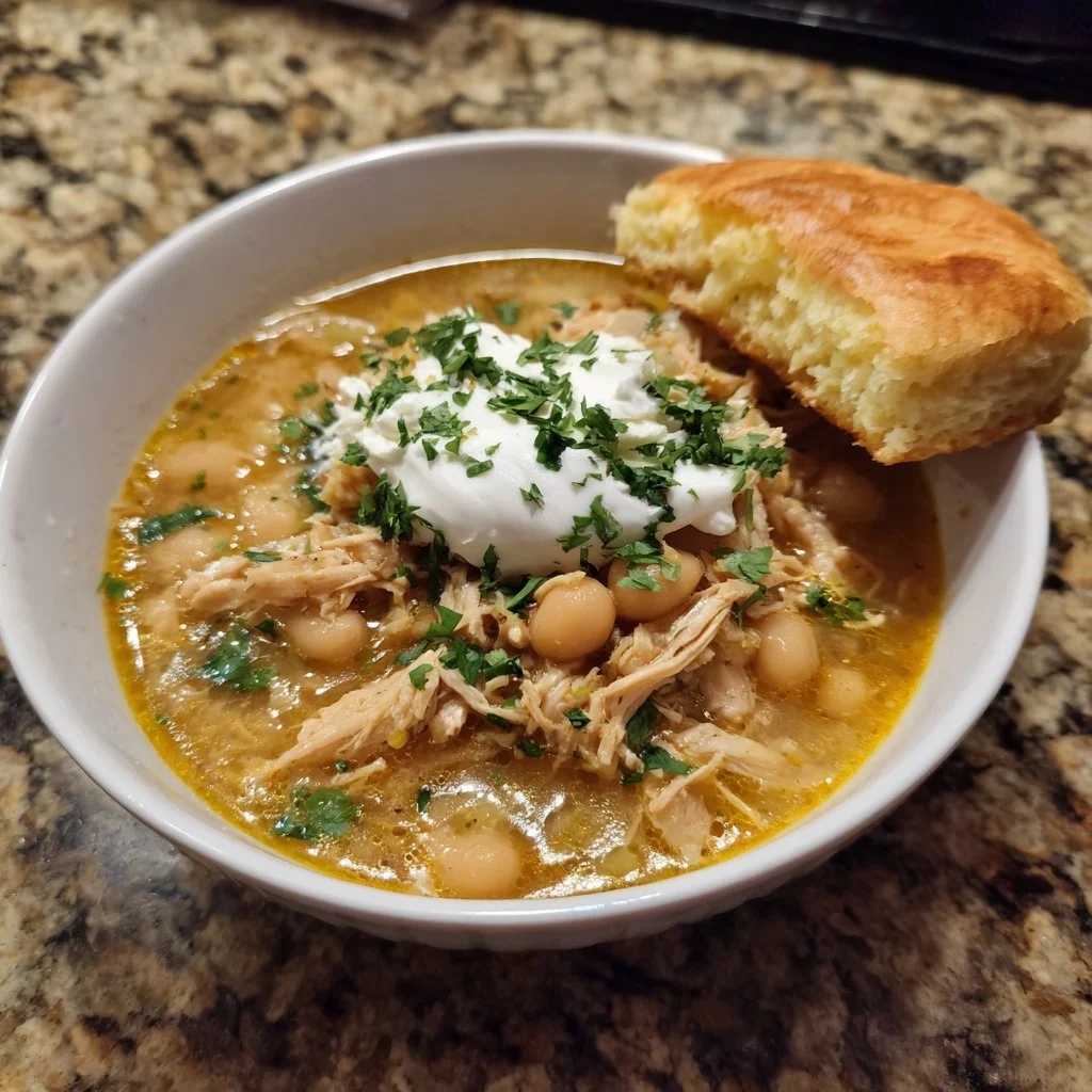 Bowl of easy Crockpot white chicken chili soup with toppings