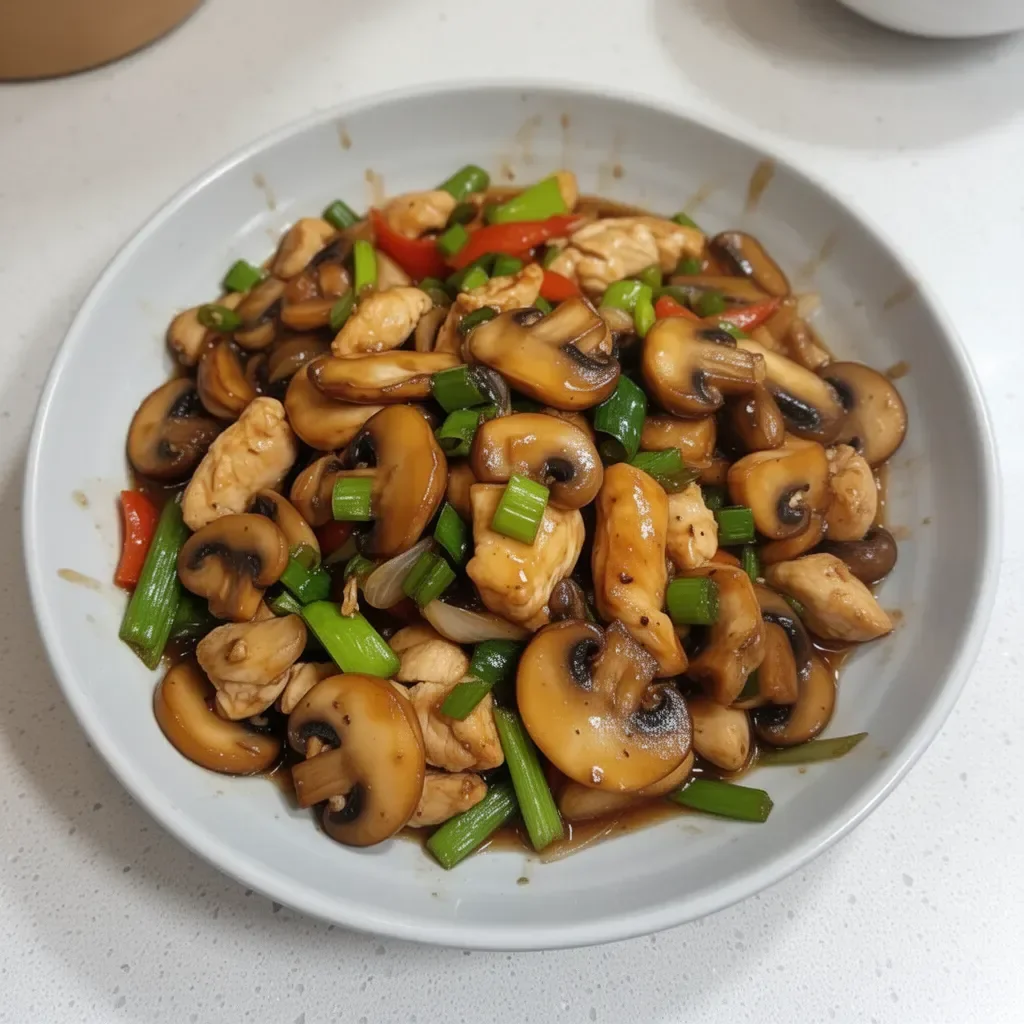 Chicken and mushroom stir-fry in a colorful stir-fry dish