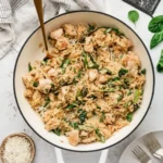 High protein chicken orzo meal served in a bowl with vegetables