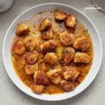 Delicious Coconut Peach Chicken recipe featuring tender chicken with coconut and peach flavors.
